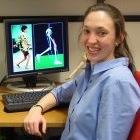 Allison Arnold sitting in front of computer