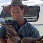 Craig McGowan holding a wallaby